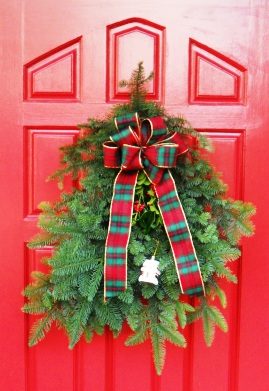 Greens for the two doors--worship and parish hall were hung.