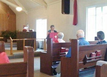 Rev. Bonnie gives the sermon today.