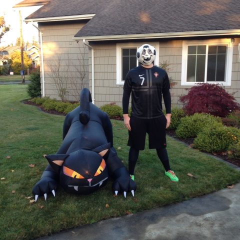 A new blowup decoration for the church for Halloween--a scary black cat!  The other soccer head guy is one of our teenagers!!